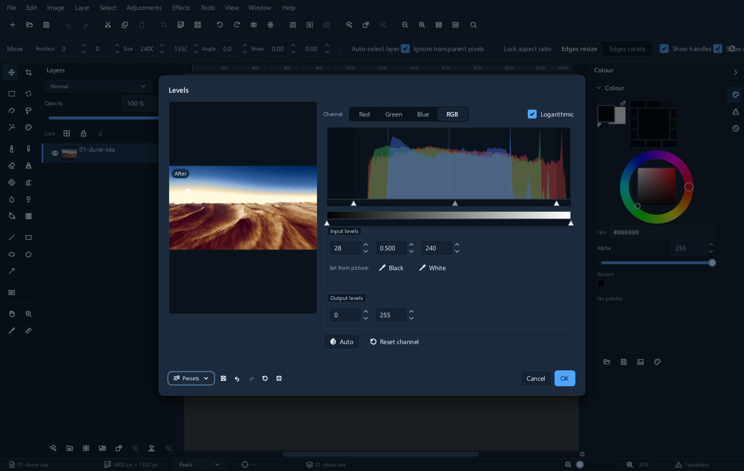 The Levels dialog, with the histogram and the black, grey and white point sliders beneath it