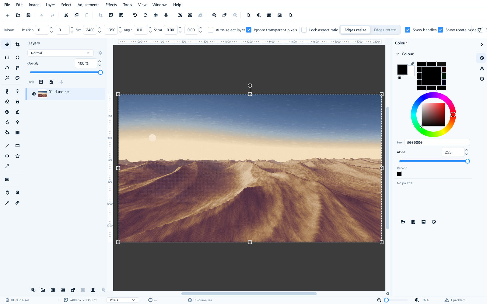 The workspace with a photograph of desert dunes open: tools down the left, layers beside them, the picture in the centre and the colour panel on the right